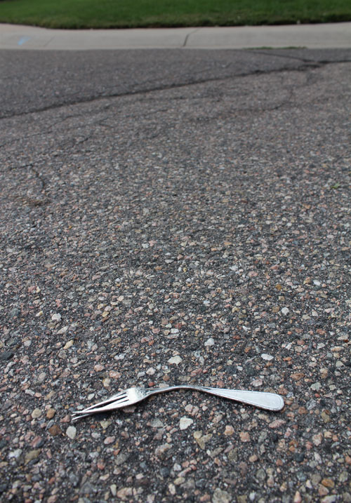 a fork sitting in the road