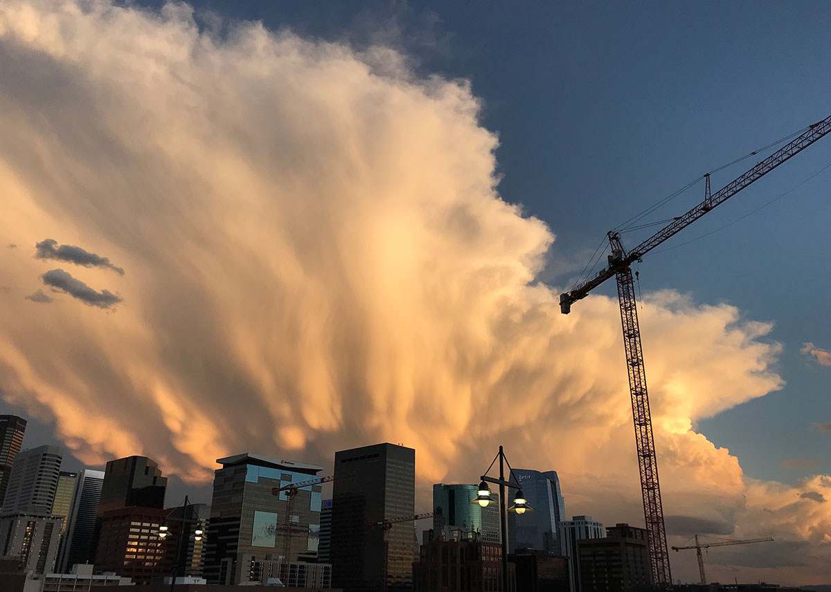 Skyline of Denver with a construction crane